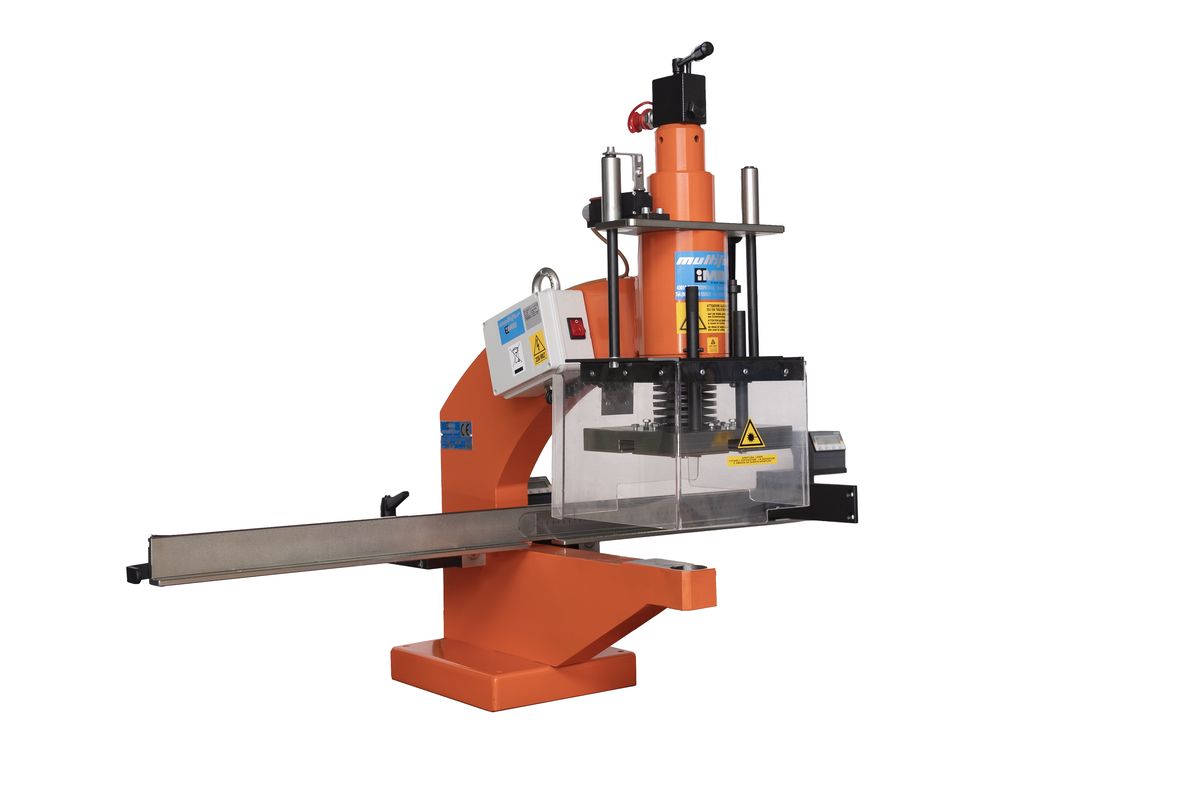 The same orange machine cut out on a white background: the cylinder, the clear guard, the long rail in the foreground.